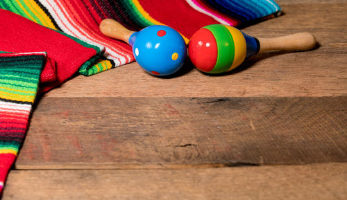 Close-up of multi colored balls on table