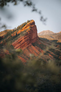 Rock formations on mountain against sky
