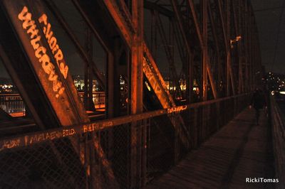View of bridge in city at night