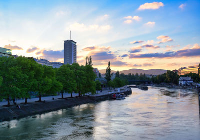 View of bridge over river against buildings