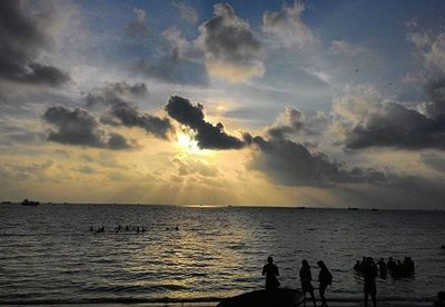 Scenic view of sea at sunset