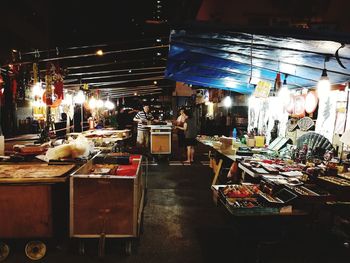 View of market stall at night