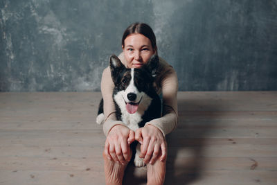 Portrait of woman with dog