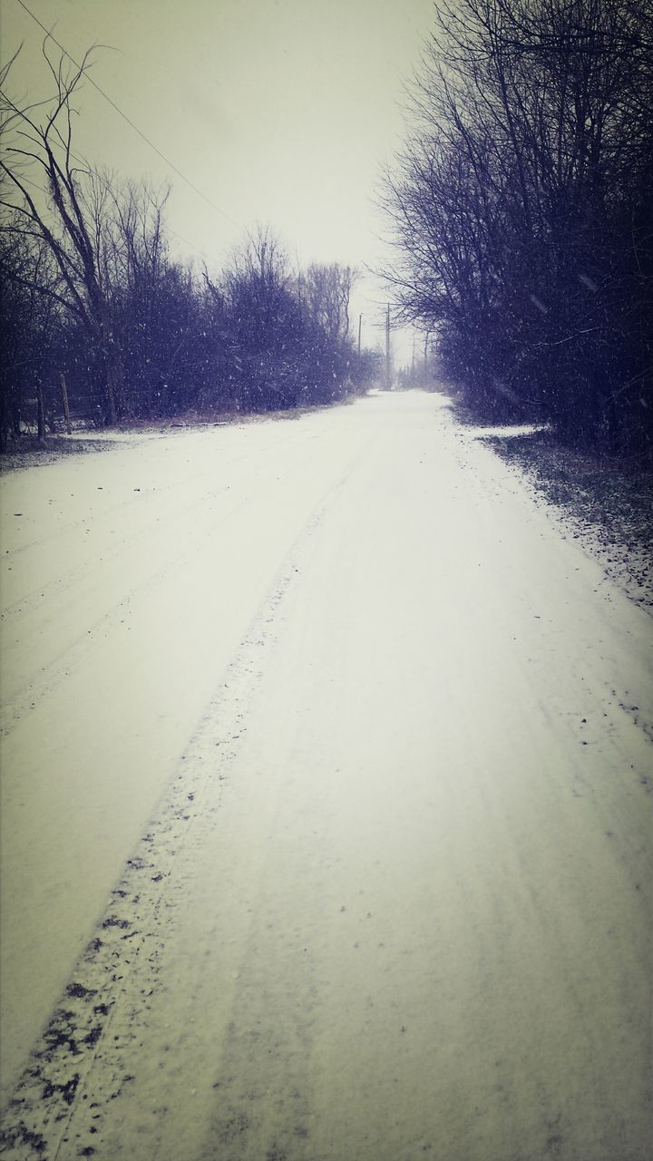 snow, the way forward, cold temperature, winter, tree, clear sky, diminishing perspective, tranquility, road, weather, tranquil scene, vanishing point, nature, landscape, season, bare tree, white color, beauty in nature, transportation, covering