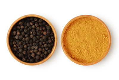 Directly above shot of coffee beans against white background