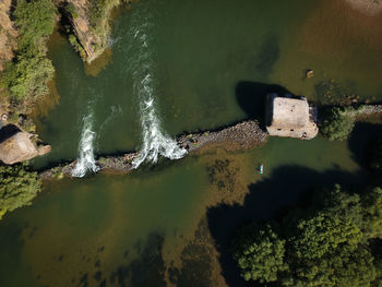 High angle view of water flowing in river