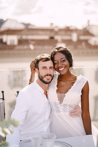 Young couple standing outdoors