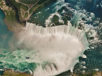 Close-up of waterfall against trees