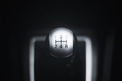 Close-up of gearshift in car