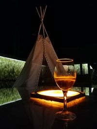 Close-up of beer glass on table