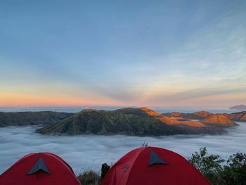 Scenic view of mountains against sky during sunset