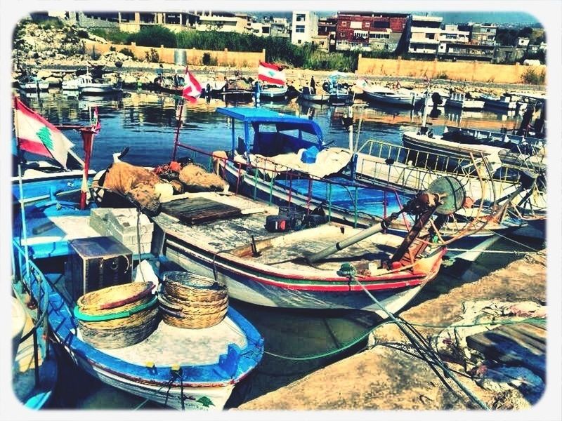 moored, nautical vessel, boat, water, transportation, mode of transport, harbor, large group of objects, transfer print, auto post production filter, sea, in a row, high angle view, abundance, day, outdoors, no people, blue, group of objects, waterfront