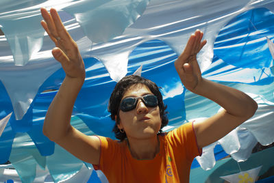 Portrait of young woman in swimming pool