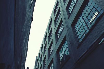 Low angle view of buildings against clear sky