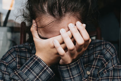 Close-up of man with hands