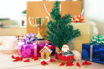 Christmas tree decoration with santa claus and gifts,
