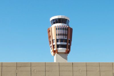 Low angle view of building against clear blue sky