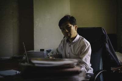 Businessman working at desk in office