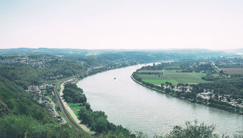 High angle view of river amidst landscape against clear sky