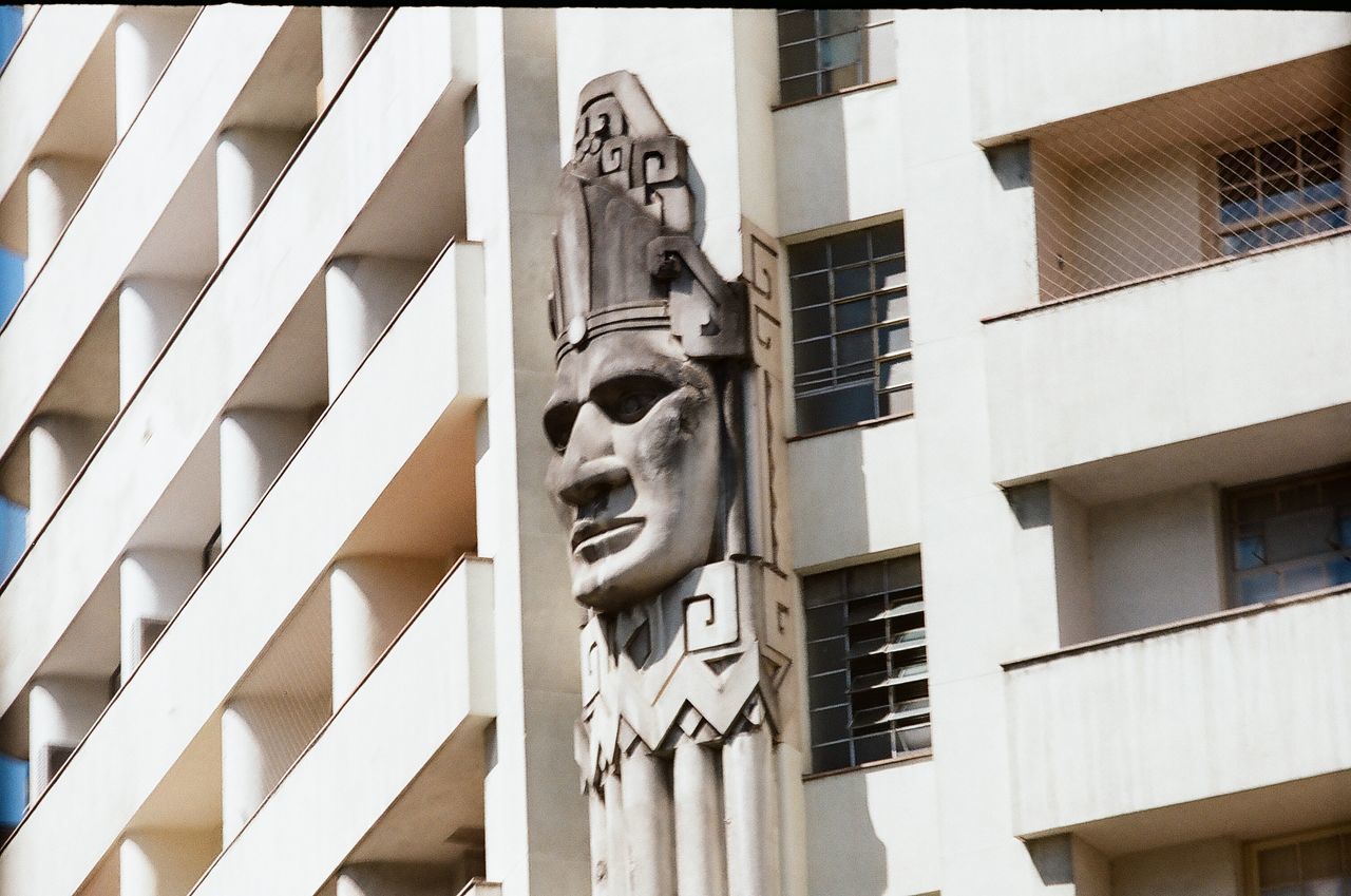 LOW ANGLE VIEW OF STATUES ON BUILDING