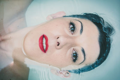 Close-up portrait of young woman