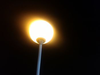 Low angle view of illuminated lights