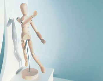 Close-up of figurine hanging