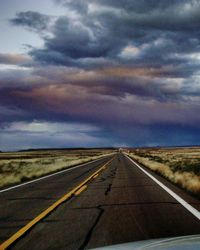 Country road passing through landscape