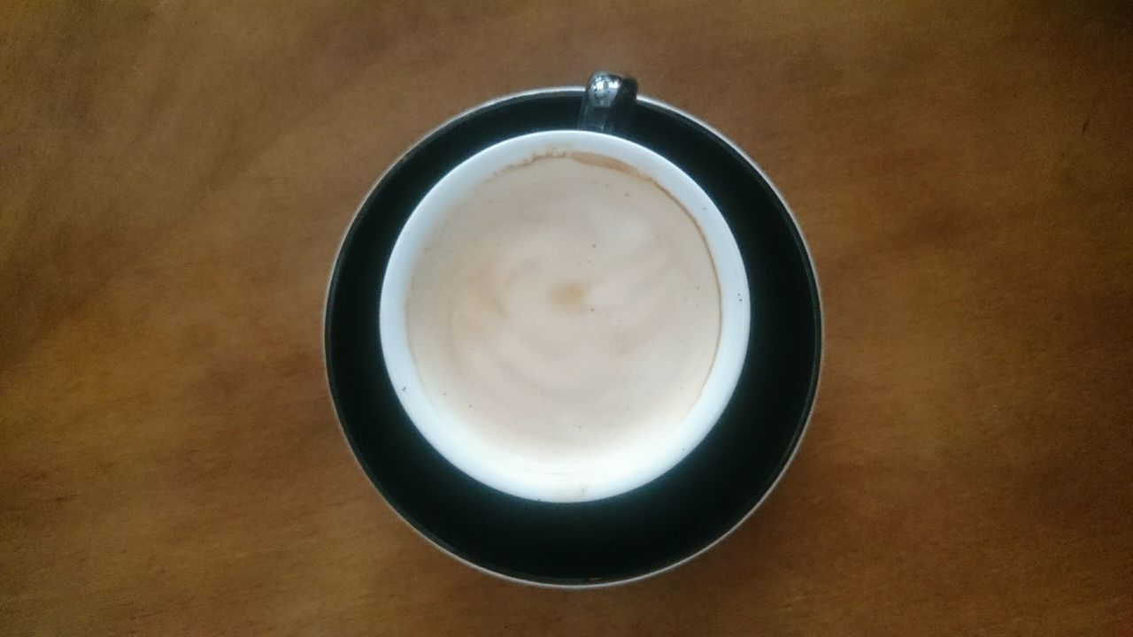 CLOSE-UP VIEW OF CUP OF BREAD ON TABLE