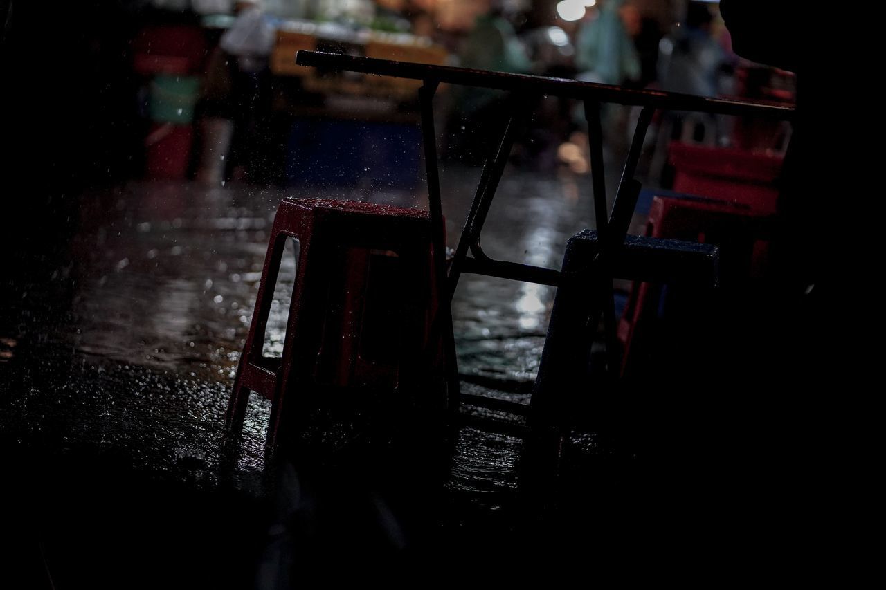 CLOSE-UP OF WET TABLE IN CITY