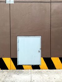 Yellow door of building
