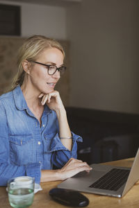 Woman using laptop