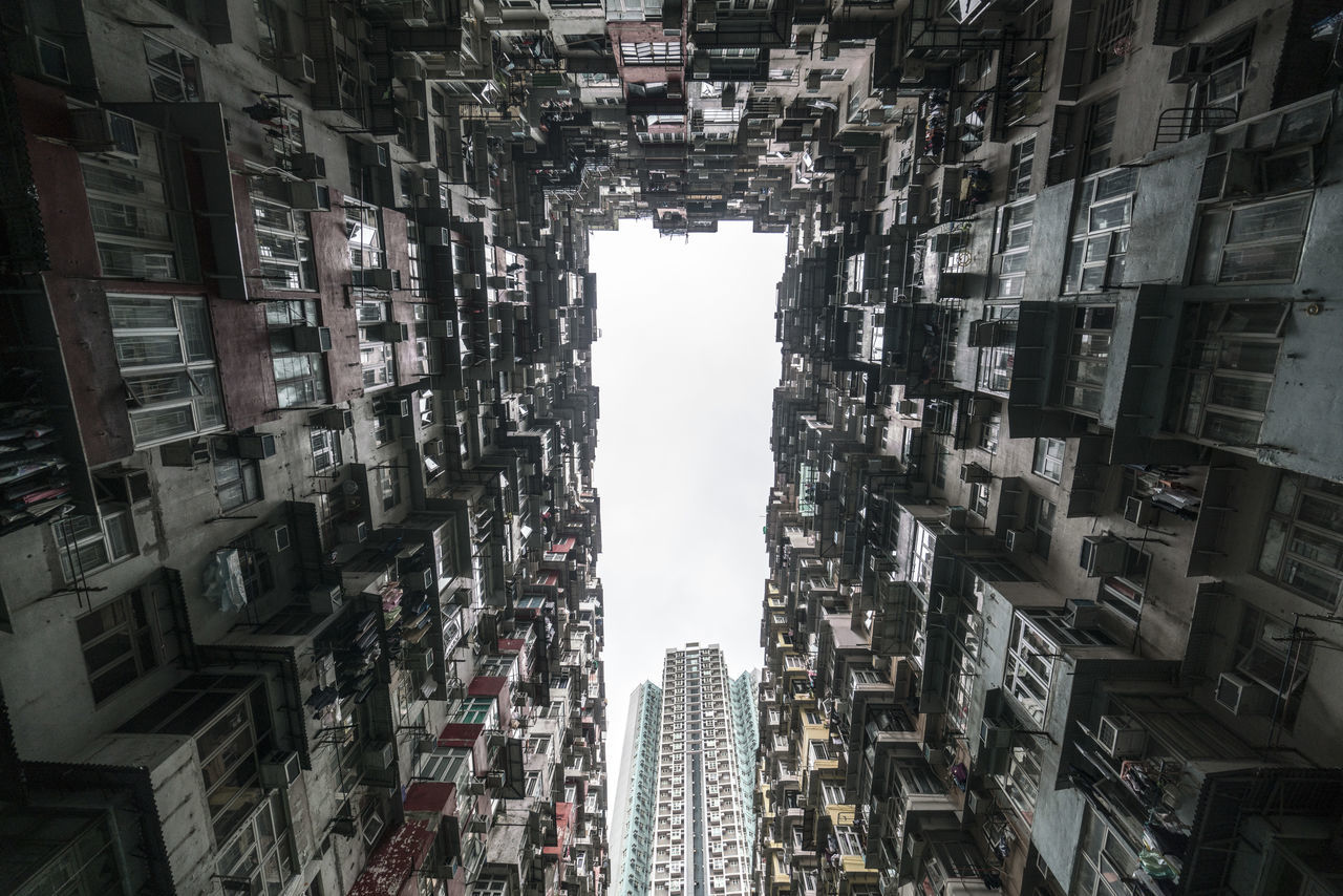 LOW ANGLE VIEW OF BUILDINGS AGAINST CLEAR SKY