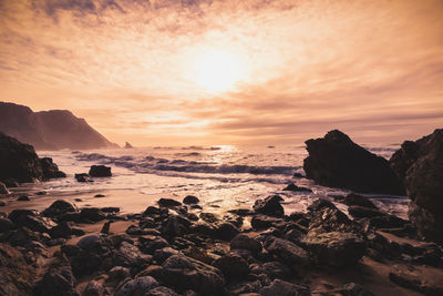 Scenic view of sea against sky during sunset