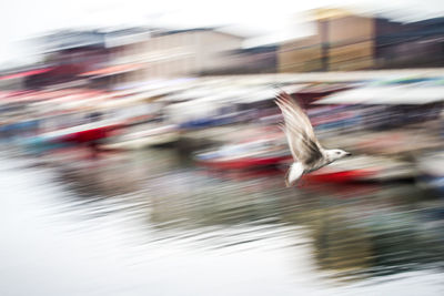 Blurred motion of vehicles on street in city