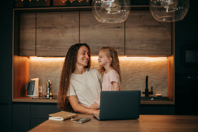 Mom and daughter in the kitchen