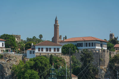 View of buildings against blue sky