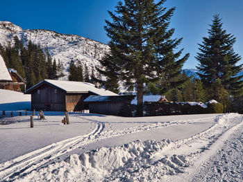 Scenic view of snow covered mountains against sky