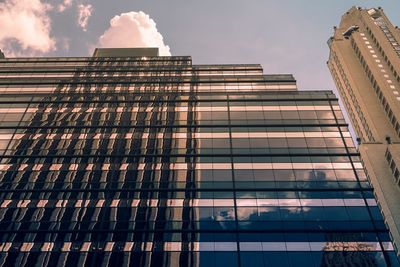 Low angle view of modern building against sky