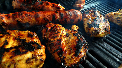 Close-up of meat on barbecue grill