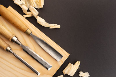 High angle view of arranged on table against black background