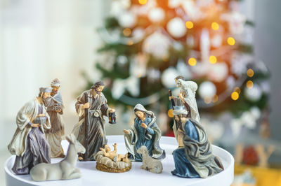 Close-up of statues on table