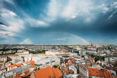 Aerial view of cityscape against sky