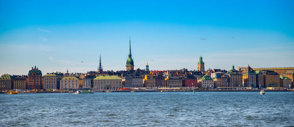View of buildings in city at waterfront