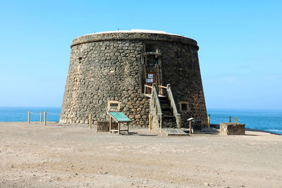 View of the castle in la caleta fuste on the island of fuerteventura, canary islands, spain