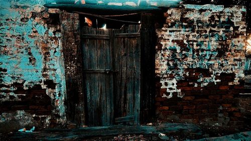 Old weathered door of building