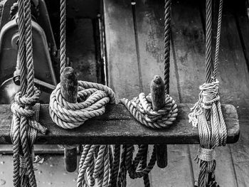 High angle view of rope tied on wooden structure