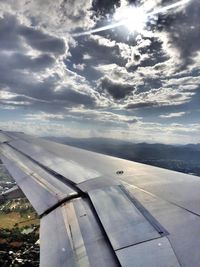 Scenic view of landscape against cloudy sky