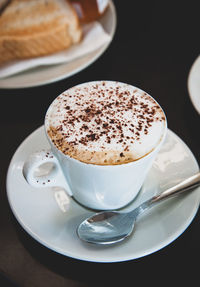 Close-up of cappuccino on table