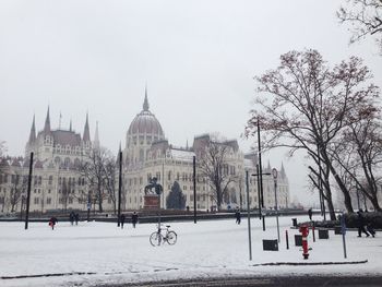 View of city against clear sky during winter